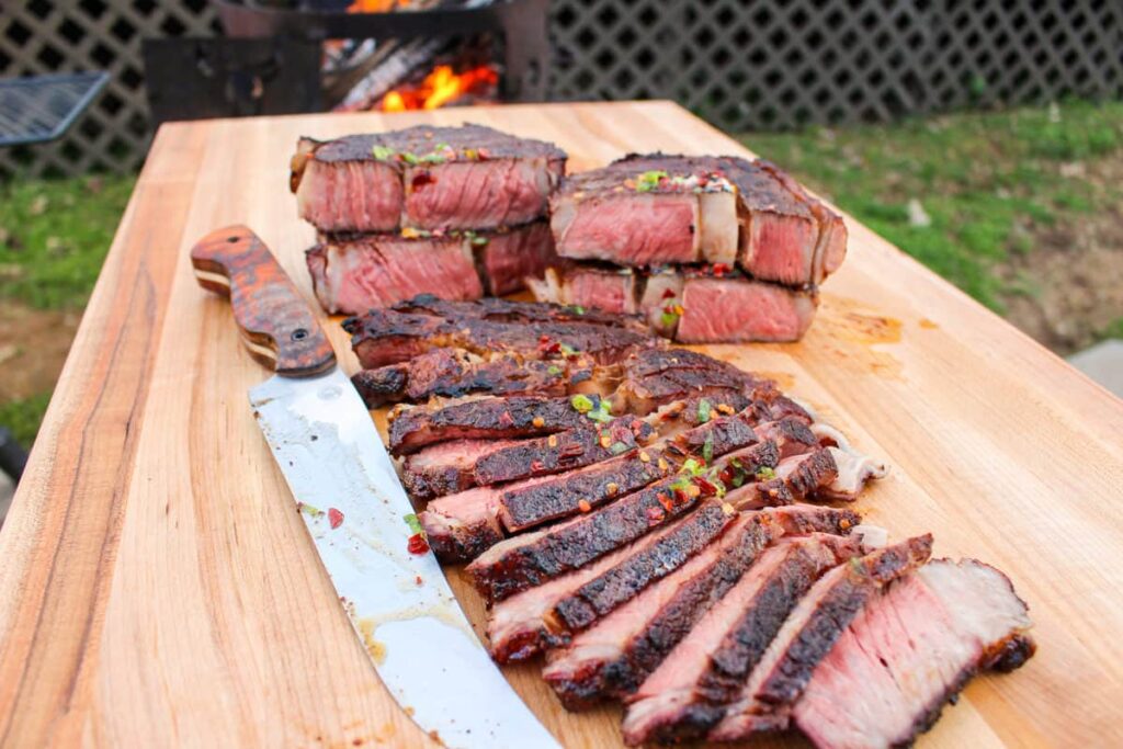 Coffee Crusted Ribeyes with Honey Chili Butter